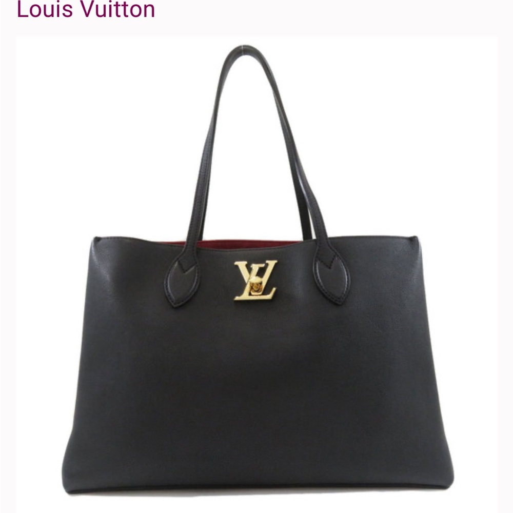 Louis Vuitton Elegant Black Tote with Gold Logo